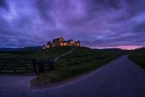 Spooky castle against purple sky
